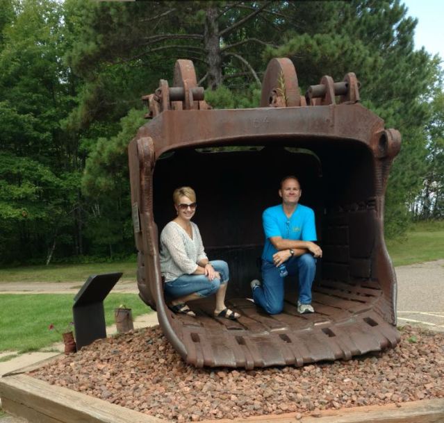 Author's friend couple inside an old mining scoop bucket.