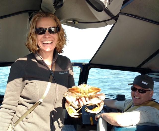The author and her brother crab fishing on his boat.
