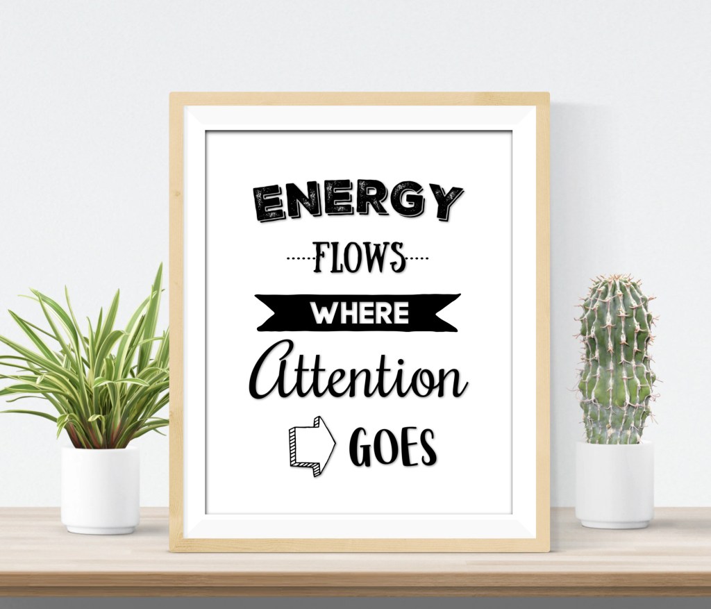 plaque that says energy flows where attention goes