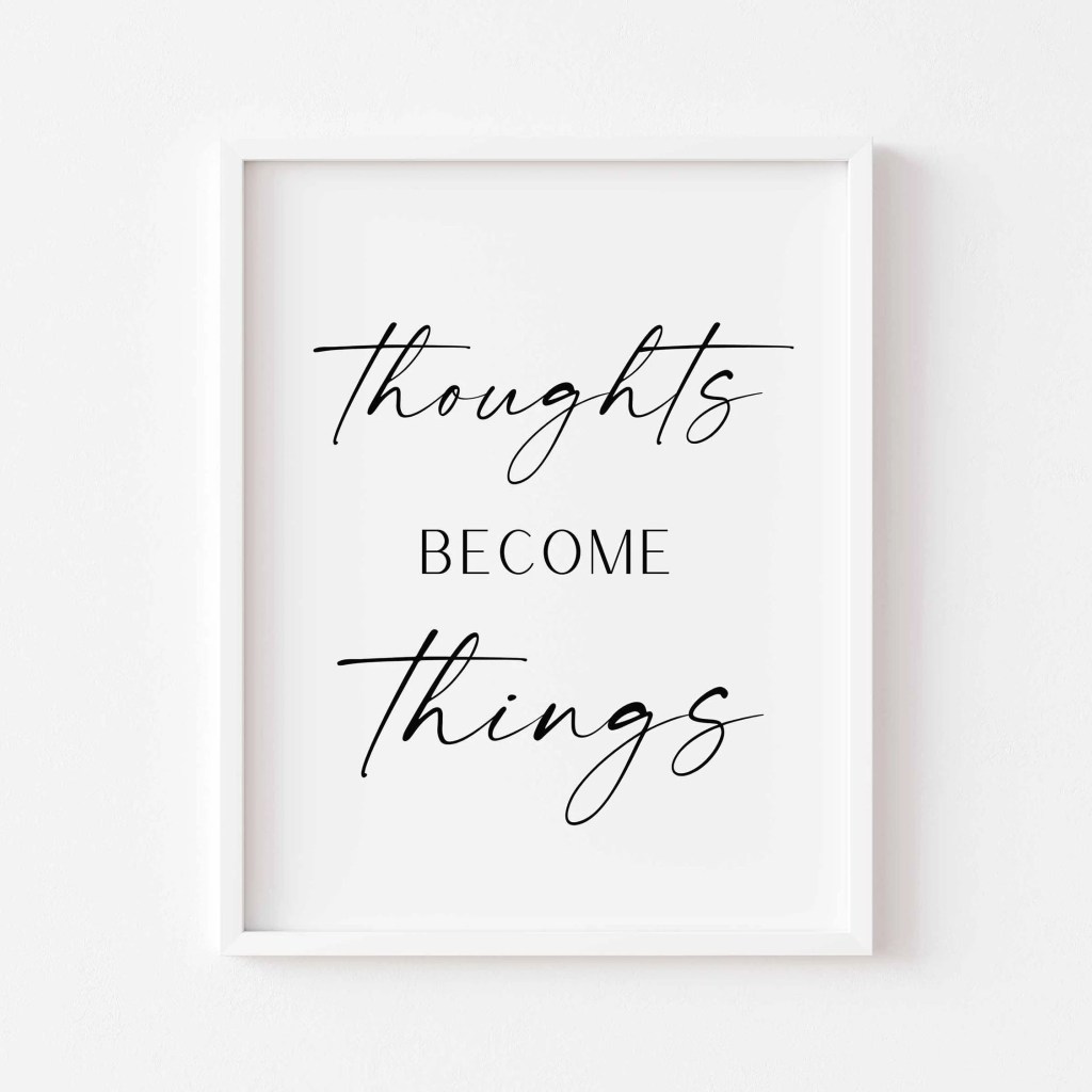 framed artwork that says thoughts become things