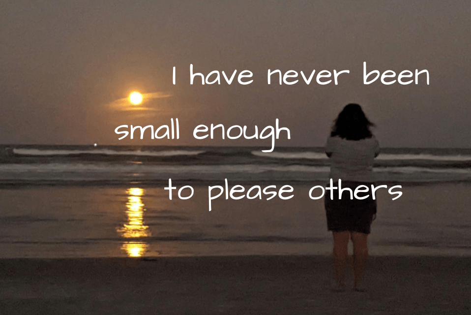 woman on the beach watching the full moon rise and reflect on the water. Text says "I have never been small enough to please others."