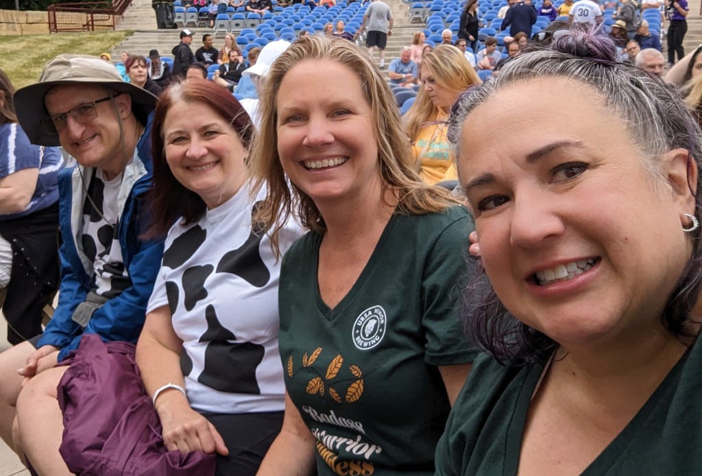 the author and three of her closest friends, at a recent outdoor concert 