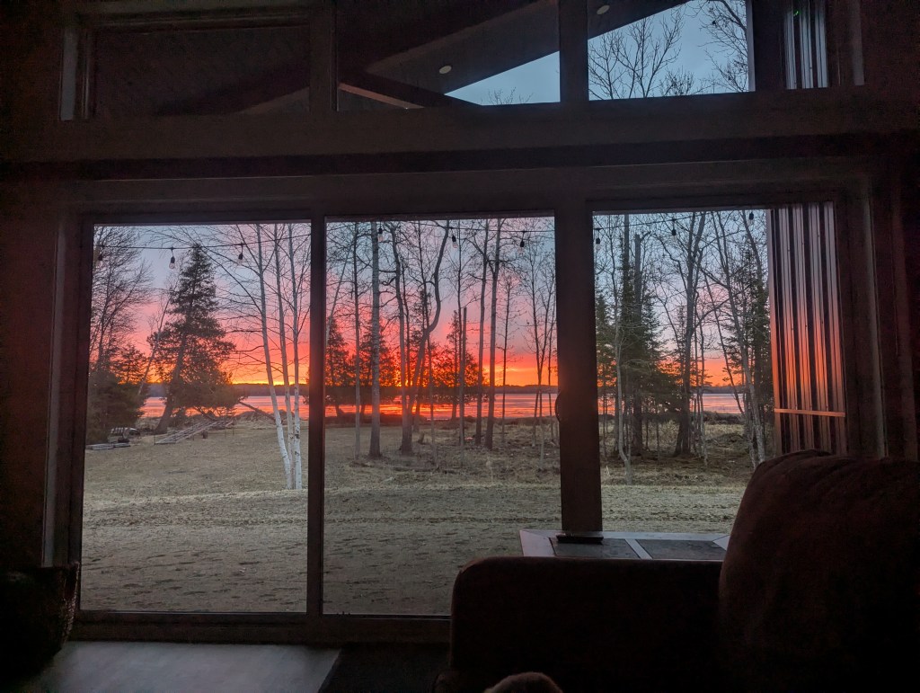view of the sunrise out the author's patio door